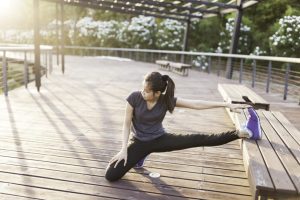 flexible-woman-stretching-with-leg-bench-1024×683 flexible-woman-stretching-with-leg-bench-1024×683